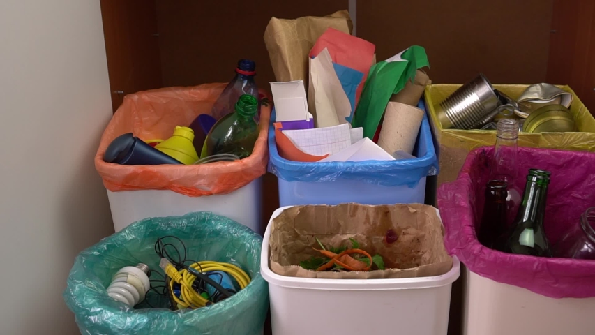 Waste Sorting. Plastic free. Recycle plastic metal glass paper organic e-waste. Trash, Recycling and Compost. Household garbage sorting and recycling bin. Waste Separation Concept Royalty-Free Stock Footage #1057702138