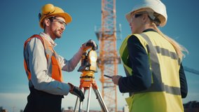 Construction Worker Using Theodolite Surveying Optical Instrument for Measuring Angles in Horizontal and Vertical Planes on Construction Site. Engineer and Architect Using Tablet Next to Surveyor. - Powered by Shutterstock - Get 15% off with code: PIKWIZARD15