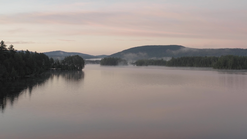 Gliding over Prong Pond during beautiful sunrise