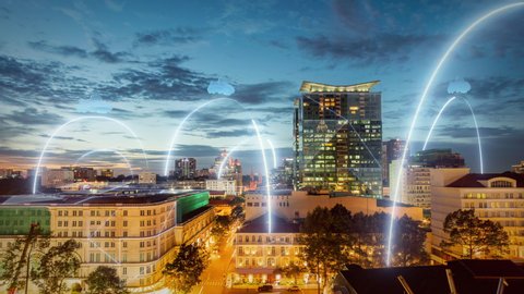 aerial time lapse of saigon sunset skyscraper city connected through 5G Wireless network, mobile technology concept, data communication, virtual reality futuristic era