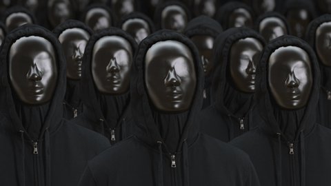 Unknown people wearing black masks and dark clothes raise their heads. Anonymosity, identity or equality concepts