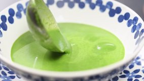 Serving a tasty creamy spinach soup. - Powered by Shutterstock - Get 15% off with code: PIKWIZARD15