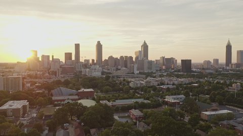 Atlanta Aerial  Extended downtown sunset cityscape flying from Sweet Auburn through downtown skyline and beyond - September 2018