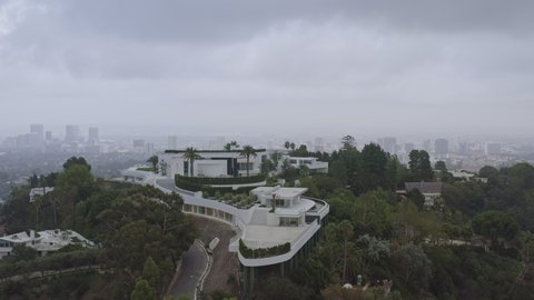Los Angeles Aerial  Panning detail of large modern mansion under construction - October 2019