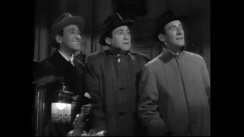 CIRCA 1939 - In this classic horror comedy, a trio of detectives are welcomed into a mansion on a stormy night by a stoic butler.