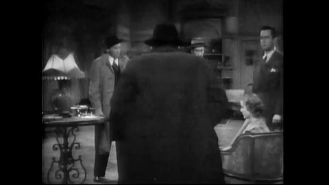 CIRCA 1939 - In this classic horror comedy, a trio of detectives (the Ritz Brothers) interrogates the trainer of an escaped gorilla in a mansion.