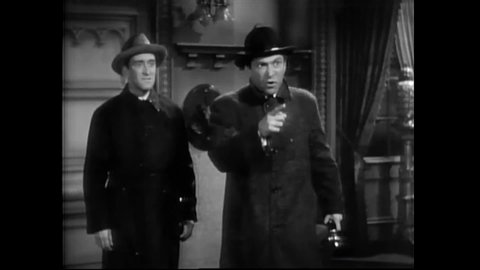 CIRCA 1939 - In this classic horror comedy, a trio of detectives comes into a mansion from a rainy night to investigate a threatening message.