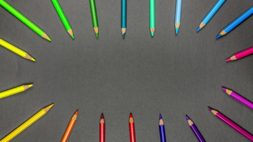 Stop motion animation. Pencils of different colors are located on grey background, changing colors, Place for text. | Shutterstock HD Video #1057737061
