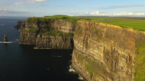 Cliffs of Moher, Clare, Ireland, August 2020, Drone tracks out to sea revealing O'Brien's Tower and Pinnacle Rock.
