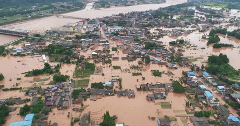 Aerial view of small town village in flood Flooded Chinese neighbourhood in Leshan Sichuan China at 2020 Homes, houses overflowing water