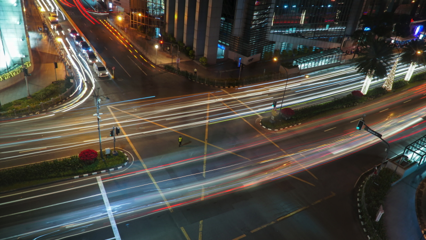 Vehicles Travelling On The Bustling Street In Ayala Avenue, Makati City At Night - timelapse