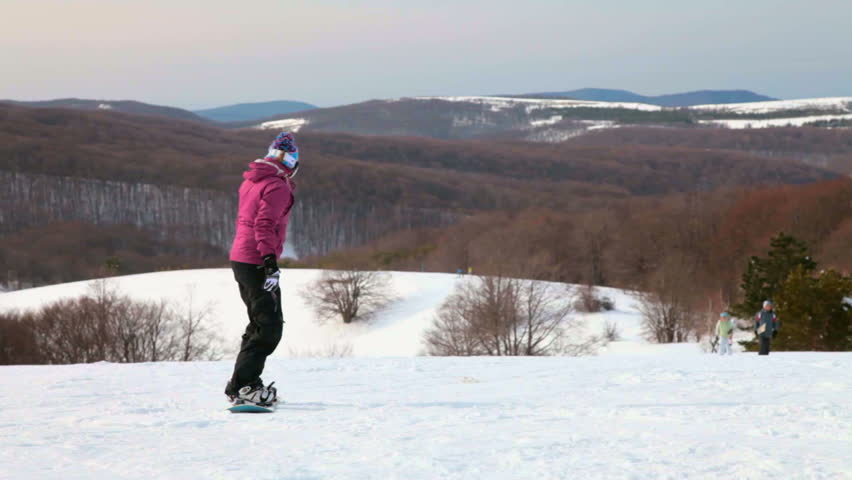 Snowboarder on mountain