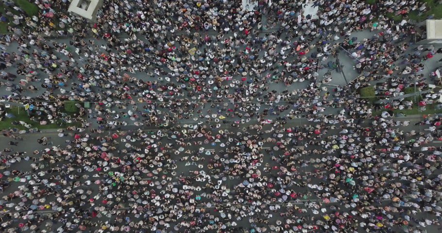 Top Aerial shot on Protesting people manifestation  Royalty-Free Stock Footage #1057791763
