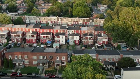 Aerial truck shot of slums in United States, low income, poverty housing, slumlord, crime district, urban America city establishing shot