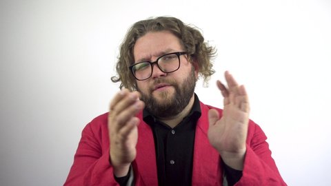 Clapping sarcastically. Young bearded man applauding. White background.