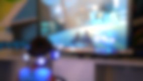 Blurred background. Kiev, Ukraine August 16, 2017: -Child in a virtual reality helmet plays a computer game - Powered by Shutterstock - Get 15% off with code: PIKWIZARD15