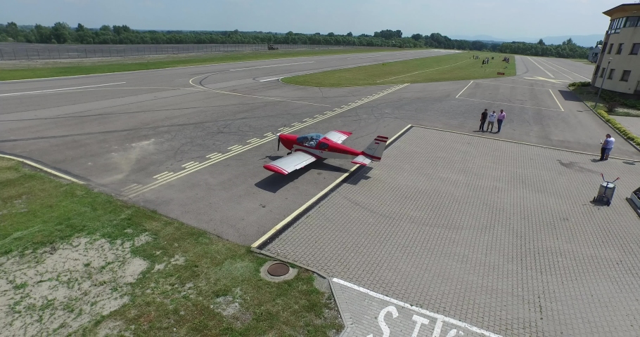 Aerial view of an airplane at the airport preparing for take-off