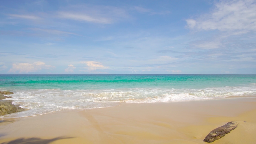 Landscape Beach Sea, Phuket, Thailand. Landscape view of beach sea sand and sky in summer day. Beach space area. At Karon Beach, Phuket, Thailand. On 20 August 2020. 4K UHD. Video Clip