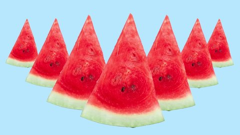 many red watermelon slices animated on a blue background. seamless looping of realistic 3d food. creative pattern with healthy food