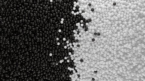 3d animation of wave black and white small balls demonstrate clash or conflict mixing to each other top view opposition of digital futuristic spheres concept of confrontation