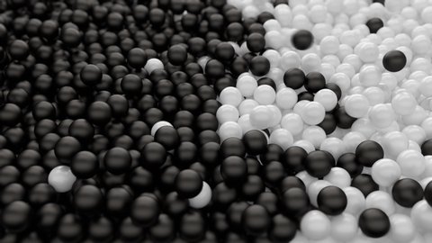 4k 3D animation futuristic black and white balls collide and mixing to each other isolated 3d digital animation of small glossy spheres during movement concept of opposition or fight