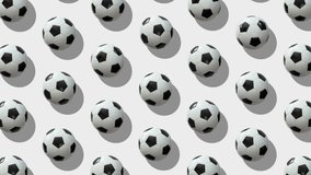 Background from large group of soccer balls. 
Balls rotate around their axes on white background. Flat lay, top view. Isometric view. Seamless loop video. 