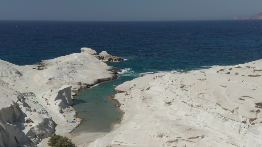 Wide Aerial Establishing Shot of Sarakiniko Lunar Volcanic Beach in Milos Island, Greece