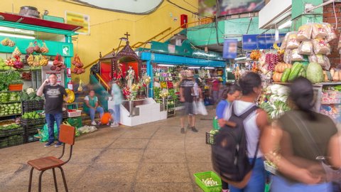 Surquillo Market timelapse hyperlapse, Lima, Peru. Lima's biggest food market. Sellers at the counters sell vegetables, fruits and meat