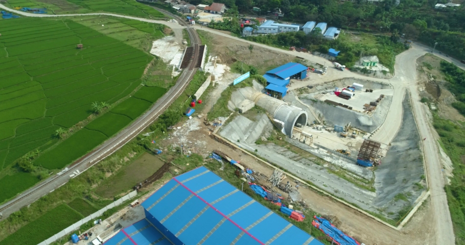 Scenic aerial view of jakarta bandung high speed train construction project  near cimeta bridge and cipularang toll road, padalarang bandung, indonesia