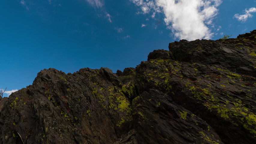 Time lapse tracking shot of rugged rock formation in White Mountain, California