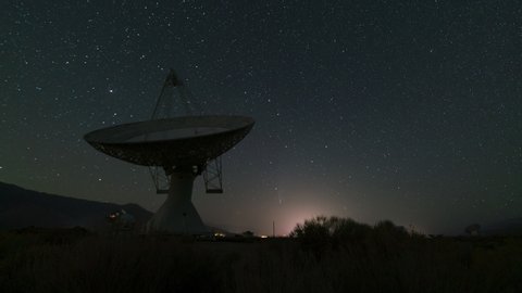 Time lapse tracking shot of Comet Neowise through radio observatory in Eastern Sierra, California