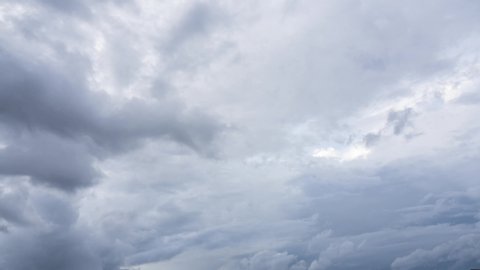 Timelapse gray clouds in rainy season, stormy dramatic cloudy day before rain in a tropical country, sky rolling slow motion in space nature background video screen. Footage B Roll Timelapse Sky.