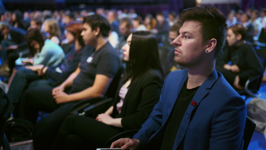 Crowd student study forum business man audience college. Auditorium person learn education. Viewer crowded university studying seminar. Audience group people listen educational speech high school.