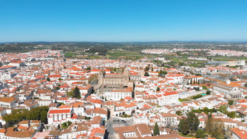 Historic Evora with white houses and red roofs and landmarks, Alentejo, Portugal | Shutterstock HD Video #1057955416