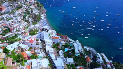 Aerial Drone View of Positano, near Naples, Italy.
Historic White town along the Amalfi Coast Near Salerno. High view of the Beach and Blue Ocean with boats.