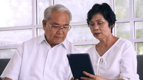 Asian elderly couple spending time together at home.