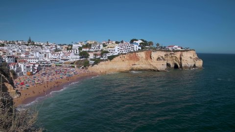Carvoeiro, Portugal - August 20, 2020: View of the scenic beach at the village of Carvoeiro, in Algarve, Portugal.