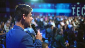 Viewer crowded audience speak with speaker in microphone. Participant forum speaking. Educational speech business man. Speaker group auditorium people. Presenter talk. Education conference spectator. - Powered by Shutterstock - Get 15% off with code: PIKWIZARD15