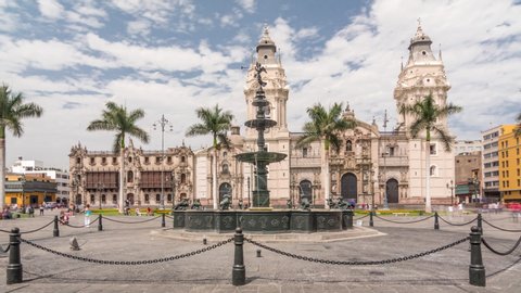 Fountain on The Plaza de Armas timelapse hyperlapse, also known as the Plaza Mayor, sits at the heart of Lima's historic center. Cathedral on a background