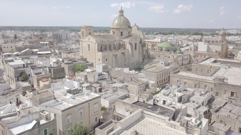 Aerial view of Basilica Minore Pontificia Santissimo Rosario Cathedral in Francavilla Fontana Puglia Italy. Italian religious catholic church baroque architecture. Cityscape.