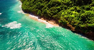 Aerial drone hyperlapse timelapse of beautiful tropical coast. The camera moves and the surrounding life turns into a toy world. Video clips for cutaways lifestyle clip or background for presentation.