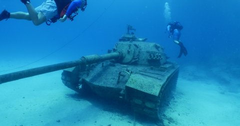 scuba diver exploring tank wreck underwater wreck dive blue water kas turkey