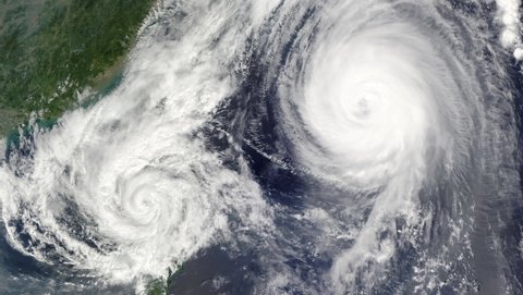 Dual hurricanes spinning in the Gulf of Mexico Cinemagraph . High quality FullHD footage. Storms brewing in the gulf for destruction of the United States coast line.