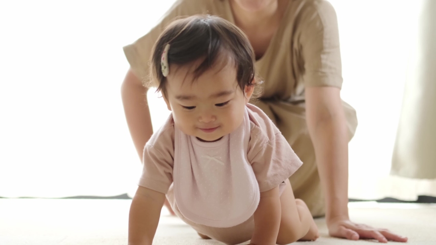 asian baby crawling at living room Royalty-Free Stock Footage #1058046070