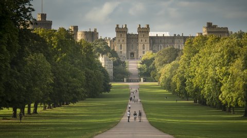 21st August, 2020 Windsor Castle, Windsor, Berkshire, England. Time Lapse of people walking along the path in front of Windsor Castle
