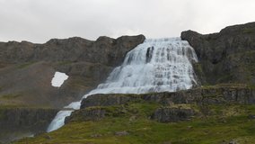 Dynjandi located on the Westfjords peninsula in northwestern Iceland. Dynjandi, also known as Fjallfoss, is a series of waterfalls that cascades 100m. 4K UHD video.