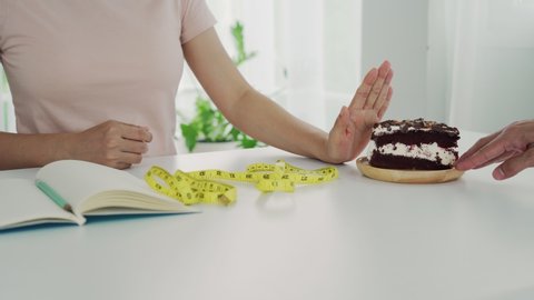 One of the health-care girls used a hand to push a plate of chocolate cake. Refuse to eat foods that contain Trans Fat.        