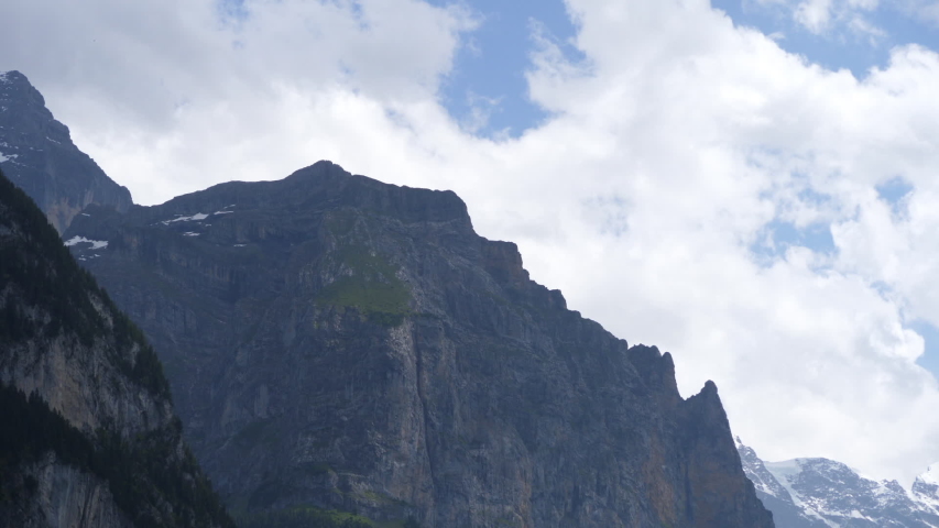 Lauterbrunnen Mountains In The Swiss Alps On An Overcast Day | Shutterstock HD Video #1058076922