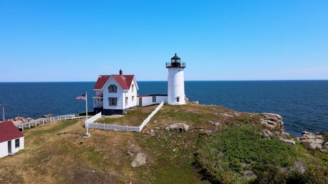 York, Maine / United States - Aug 23 2020: An front close-up aerial view of the Nubble Lighthouse with views of the ocean