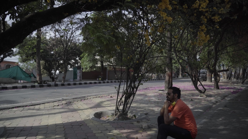 Middle age men walking in park, road, wearing a face mask during lockdown corona virus.  